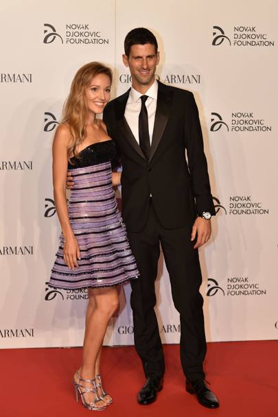 Novak Djokovic e la moglie Jelena al loro arrivo alla cena di gala al Castello Sforzesco. Afp